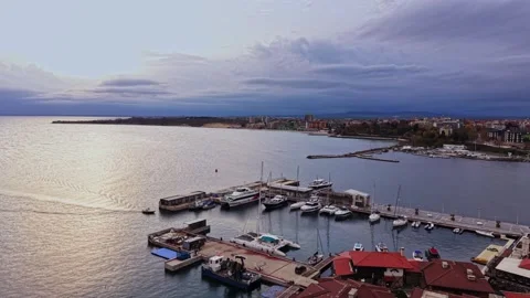 Capture of sunset over Nesebar's marina in Bulgaria from above Stock Footage 321495901