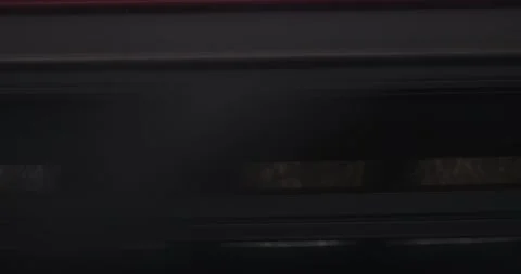 Capture the view from a train window as another train rushes by against the Vidéo 252942564