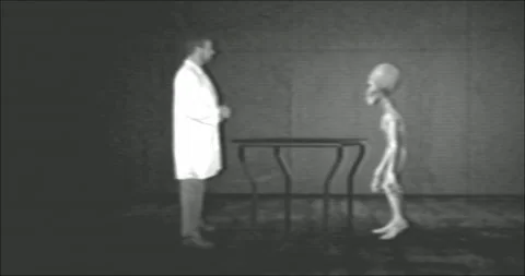 Captured alien being interrogated old fi... | Stock Video ...