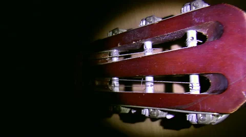 Captured old guitar closeup on black background Stock Footage 43203764