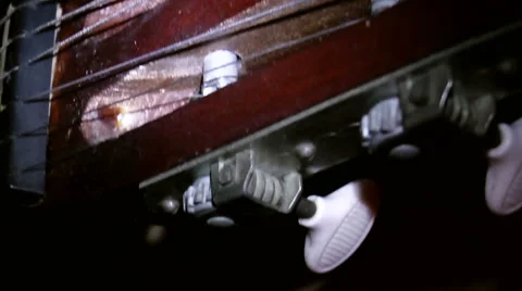 Captured old guitar closeup on black background Stock Footage 43364385