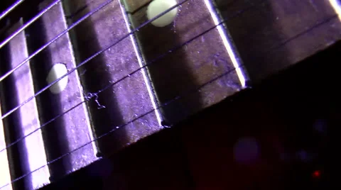 Captured old guitar closeup on black background Stock Footage 43364574