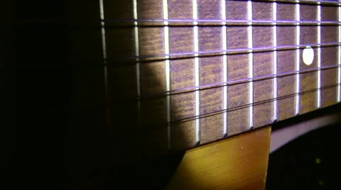 Captured old guitar closeup on black background Видео 43364740