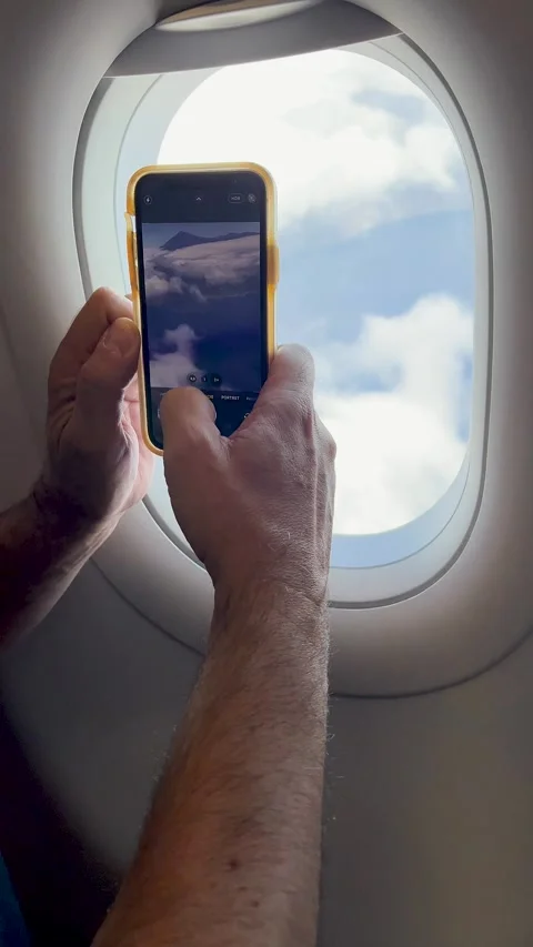 Capturing Beautiful Clouds from an Airplane Window During a Breathtaking Journey Stock Footage 318620144