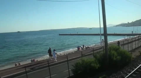 Capturing the beauty of a beach and the sea on a sunny summer day Stock Footage 14355141