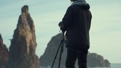Capturing the beauty of ilheus da ribeira rock formations by a photographer Stock Footage 321461398