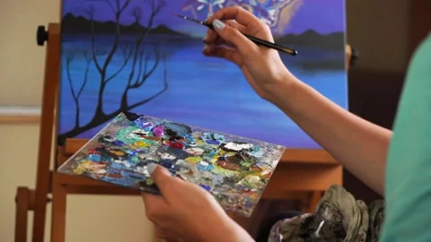 Capturing Creativity: Female Painter in Studio. Stock Footage 248227234