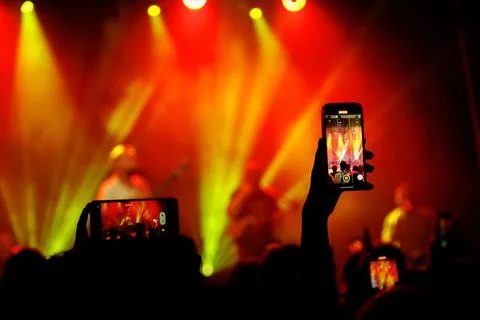 Capturing the Crowd: Live Music Event Excitement Stock Photos
