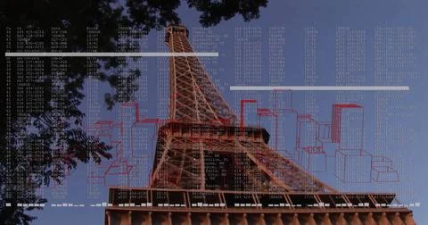 Capturing Eiffel Tower glowing against blue sky at Champ de Mars, with branches 库存照片