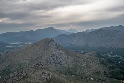 Capturing the ethereal beauty of cloud-wrapped mountains in Mallorca Stock Photos