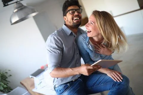 Capturing fun and happiness on tablet camera at home Stock Photos