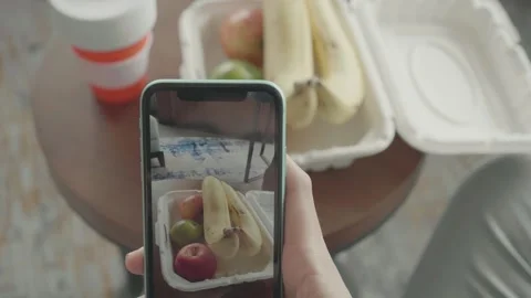 Capturing a Healthy Snack: Fruit on a Table Stock Footage 319415074