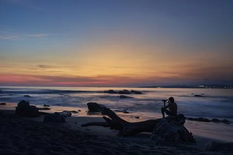 Capturing the Magic of the Sunset at Zicatela Beach 写真素材