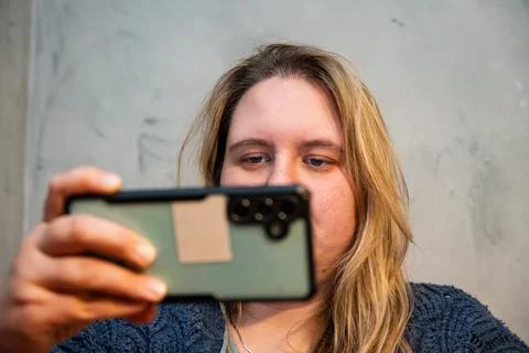 Capturing a moment of connection through technology in a serene home enviro.. Stock Photos