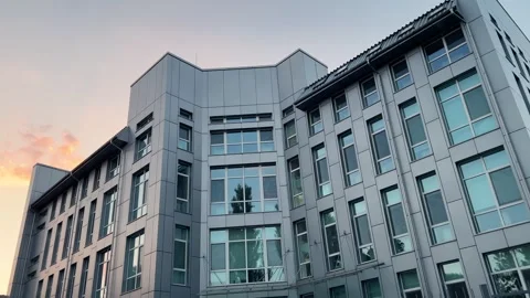Capturing the Radiant Glow: A Modern Factory Office with Metal Cladding Facade Video stock 275437280