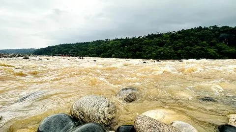 Capturing the Serene Flow of a Rapids-Filled River Stock Photos