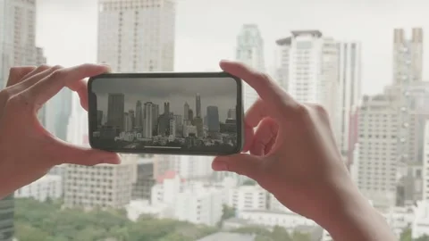 Capturing Urban Life Through a Smartphone Lens Stock Footage 333581568
