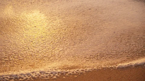 Capu Laurosu Beach - Slow Motion Foam Dissipating in Sand - 4K Stock Footage 242571406