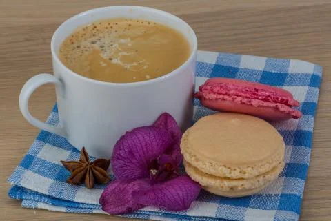 Capuccino with macaroons Stock Photos