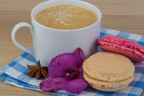 Capuccino with macaroons Stock Photos