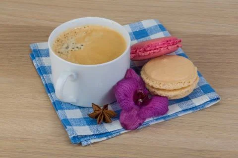 Capuccino with macaroons Stock Photos