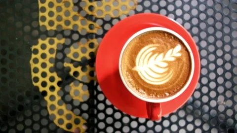 Capucinno cafelatte top view zoom in video Stock Footage 221671283