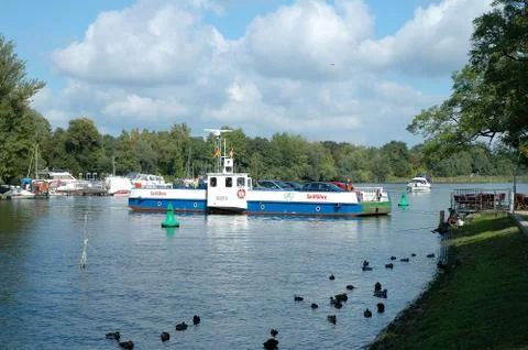 CAPUTH, GERMANY - SEPTEMBER 21: Car and passenger ferry in Caputh city in Ger Stock Photos