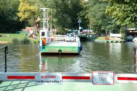 CAPUTH, GERMANY - SEPTEMBER 21: Car and passenger ferry in Caputh city in Ger Stock Photos