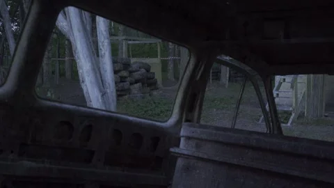 Car abandoned in the forest, tires, objects, horror, evening Stock Footage 271332469