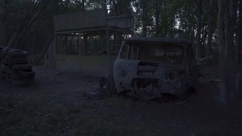 Car abandoned in the forest, tires, objects, horror, evening Stock Footage 271334726