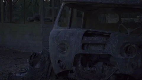 Car abandoned in the forest, tires, objects, horror, evening Stock Footage 271334814