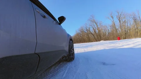 Car Accelerating With Wheel Spin on Snow, Slow Motion Stock Footage 328420964