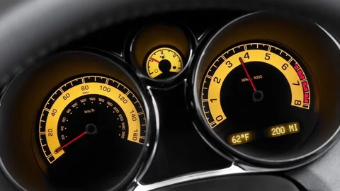 Car acceleration on yellow dashboard in a 3D animation Stock Footage 235680333