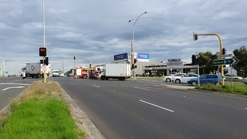 Car Accident at busy intersection Stock Footage 125290458