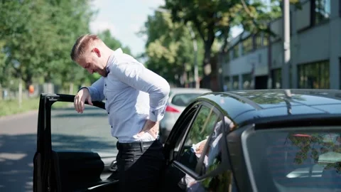 Car Accident Causes Driver Excruciating Back Pain Stock Footage 314515135