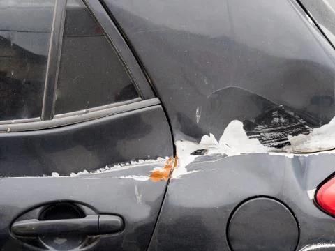 Car accident, left side view of crashed car Stock Photos