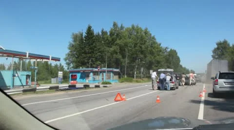 Car accident on road from four cars near filling and wood Stock Footage