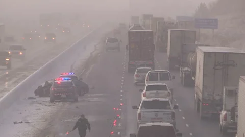 Car accident scene snow storm blizzard highway police ambulance fire trucks Stock-Footage 44189565