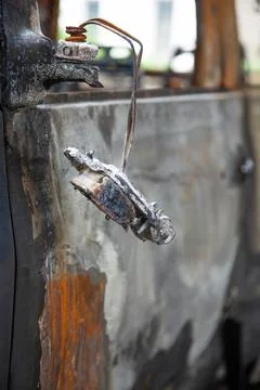 Car after a fire. Burnt rusty car after fire or accident. Car after the fire Stock Photos