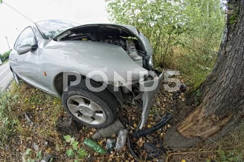 Car against a Tree, Italy Stock Photos