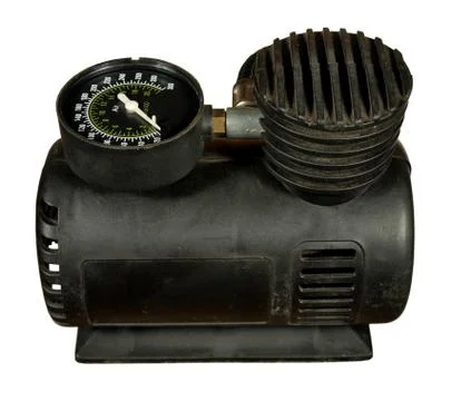Car air compressor with a manometer on a white background Foto stock