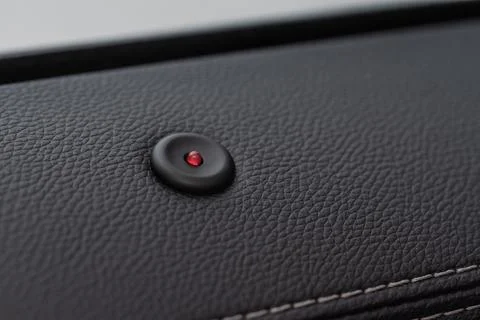 Car alarm indicator close up. Central lock red lamp. Stock Photos