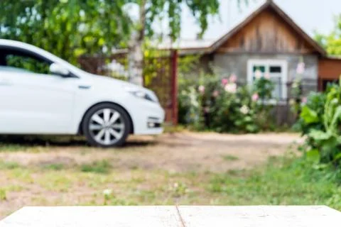 Car and house in perspective background Foto stock