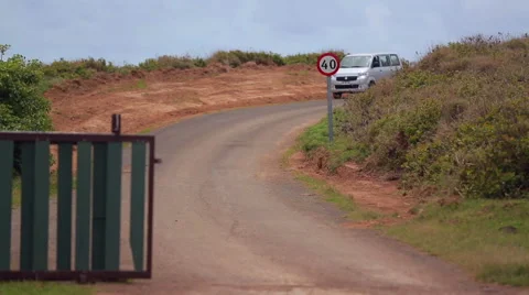 Car approaching on the road in Easter Island Stock Footage 64872206