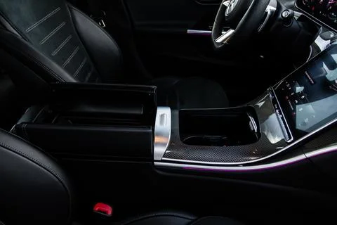 Car armrest opened. Opened armrest in the car for driver. Foto stock