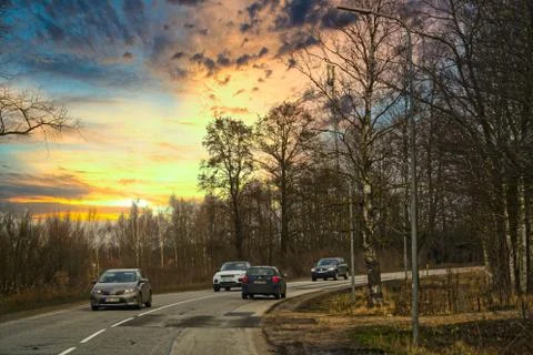 Car on asphalt road in summer Stock Photos