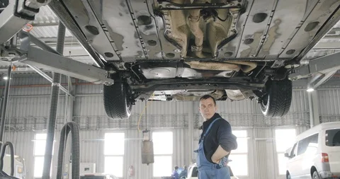 Car Auto Service Worker Cleans Tools Video stock 125012229