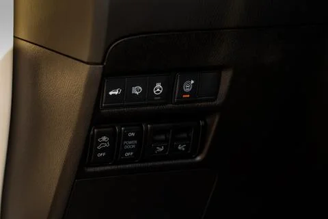 Car automatic high beam switch. Button to raise and lower the light beam. Stock Photos
