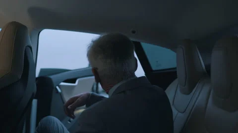 The car automatically opens the doors for the person Stock Footage 144582140