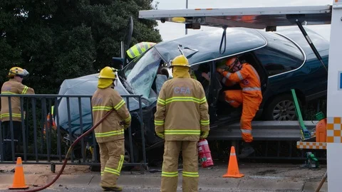 Car balanced on edge of bridge after accident. Stock Footage 93264330